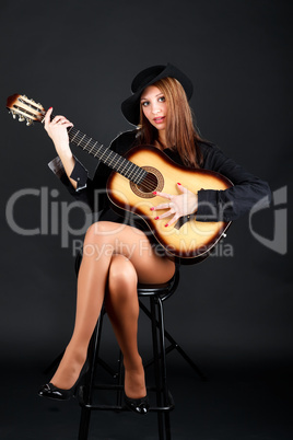 Woman with guitar.