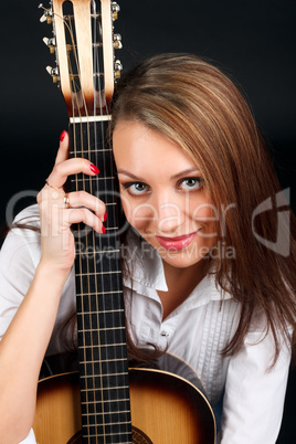 Woman with guitar.