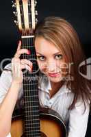 Woman with guitar.