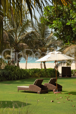 Luxurious hotel recreation area with modern deck chairs, Dubai,