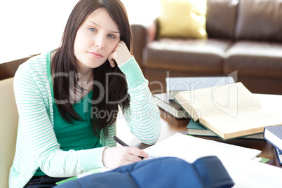 Attractive teen girl studying