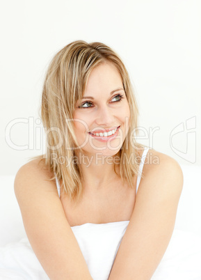 Portrait of a delighted woman bed in the morning