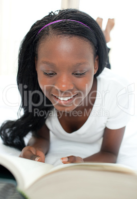 Smiling student doing her homework