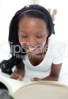 Smiling student doing her homework