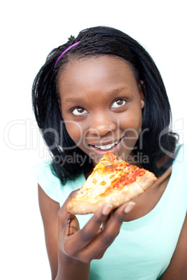 Smiling teen girl eating a pizza