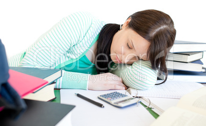 Sleeping teen girl studying