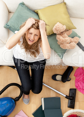Stressed young woman doing housework