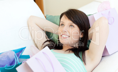 Young woman relaxing after shopping
