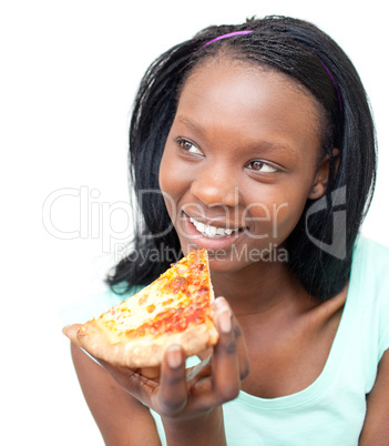 Charming young woman eating a pizza