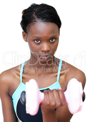 Attractive woman working out with dumbbell