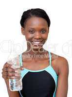 Smiling woman holding a bottle of water