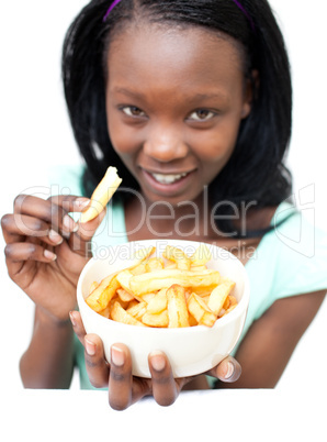 Attractive young woman eating fries