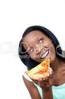 Cheerful woman eating a pizza