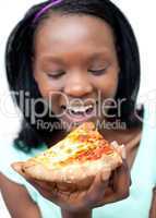 Happy woman eating a pizza