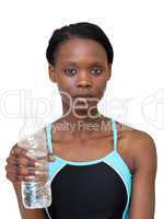 Serious woman holding a bottle of water