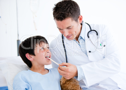 Cute little boy attending a medical exam