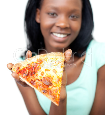Jolly teen girl holding a pizza