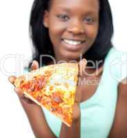 Jolly teen girl holding a pizza