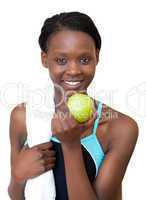 Afro-american fitness woman eating an apple