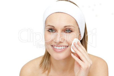 Cheerful woman putting make-up