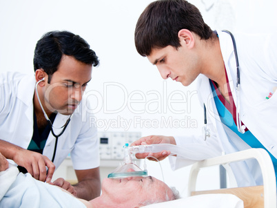 Charismatic doctors resuscitating a patient