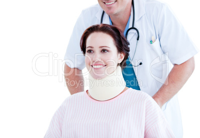 Portrait of a smiling woman with a neck brace sitting on a wheel