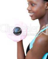 Jolly woman working out with dumbbell