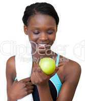 Young fitness woman eating an apple