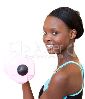 Charming woman working out with dumbbell