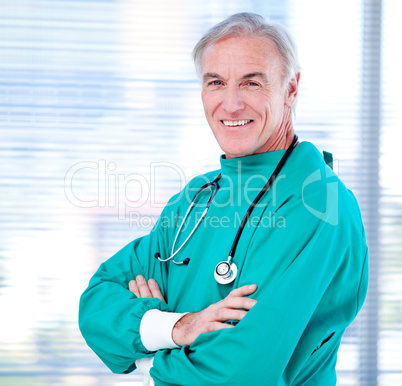 Portrait of a positive senior surgeon