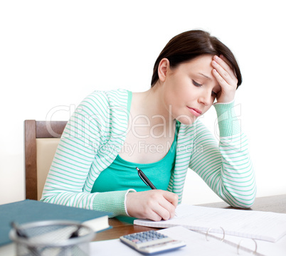 Tired student doing her homework