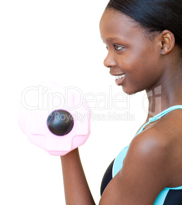 Positive woman working out with dumbbell