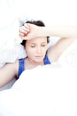 Sick teen girl lying in her bed