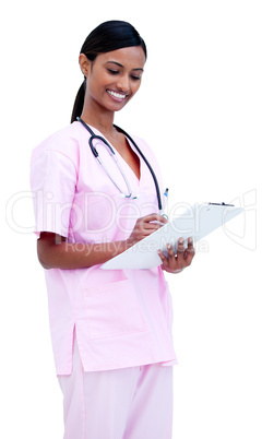 Self-assured female doctor making notes in a patient's folder