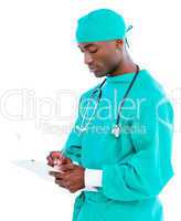Charismatic male surgeon making notes in a patient's folder