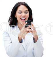 Portrait of a happy businesswoman sending a text