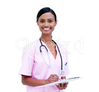 Charismatic female doctor making notes in a patient's folder