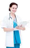 Positive female doctor making notes in a patient's folder
