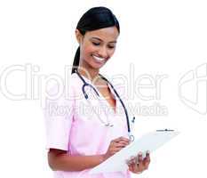 Radiant female doctor making notes in a patient's folder