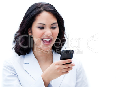 Portrait of a jolly businesswoman sending a text