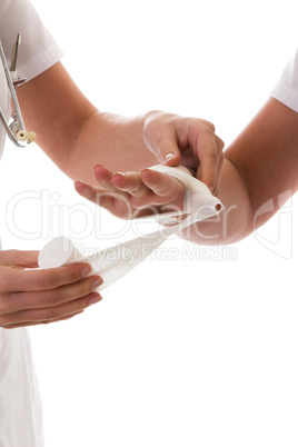 Wrapping a hand in bandage