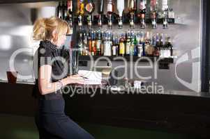 Businesswoman in the bar