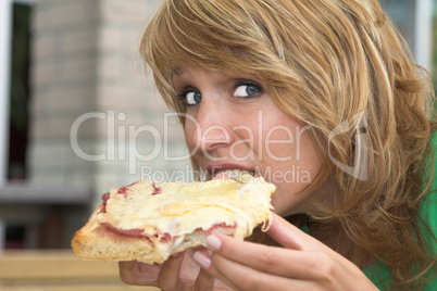 Enjoying her toast