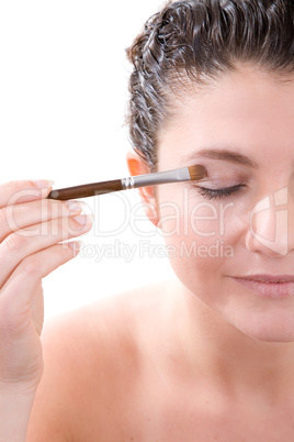 Applying eyeshadow