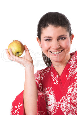 Holding up a apple