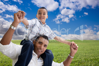 Father and Son Over Grass Field, Clouds and Sky