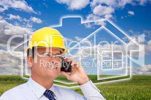 Contractor in Hardhat on Phone Over House, Grass and Clouds