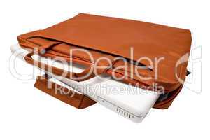 Orange bag and white laptop