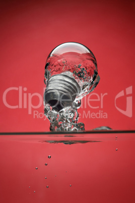 Light Bulb emerging out of water concept