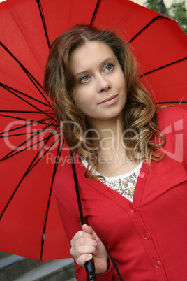 Girl in red under the umbrella